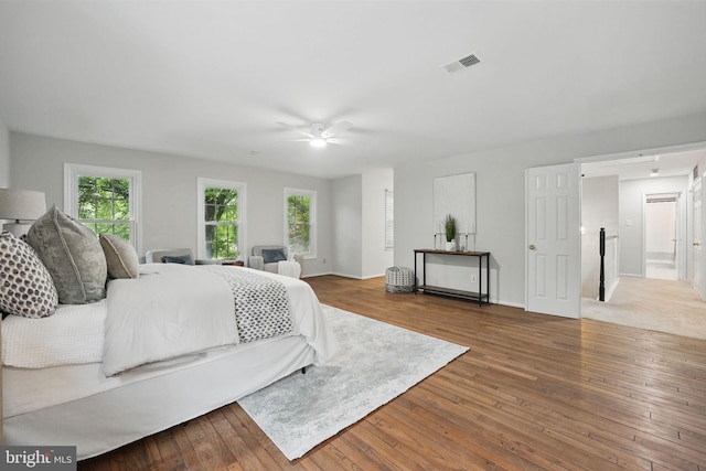 2624 Black Fir Ct, Reston, VA 20191 - bedroom featuring wood-type flooring, baseboards, and ceiling fan