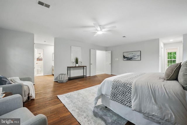 2624 Black Fir Ct, Reston, VA 20191 - bedroom featuring wood finished floors, ceiling fan, ensuite bath, and baseboards