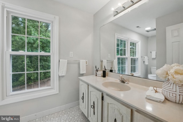 2624 Black Fir Ct, Reston, VA 20191 - bathroom with vanity, baseboards, tile patterned floors, and toilet