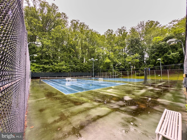 2624 Black Fir Ct, Reston, VA 20191 - view of tennis court with view of scattered trees