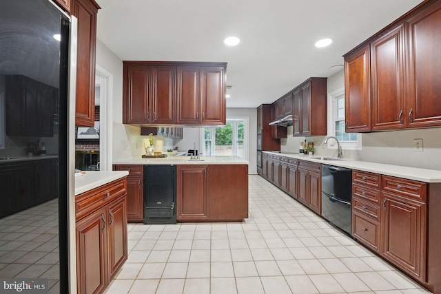 2624 Black Fir Ct, Reston, VA 20191 - kitchen with dishwasher, under cabinet range hood, light countertops, and recessed lighting