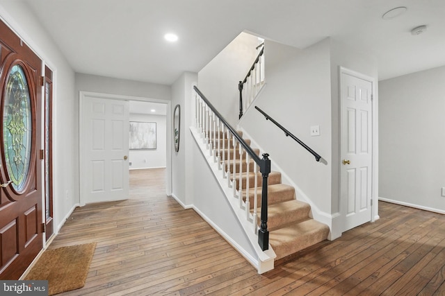 2624 Black Fir Ct, Reston, VA 20191 - foyer entrance featuring wood-type flooring, stairs, recessed lighting, baseboards, and healthy amount of natural light