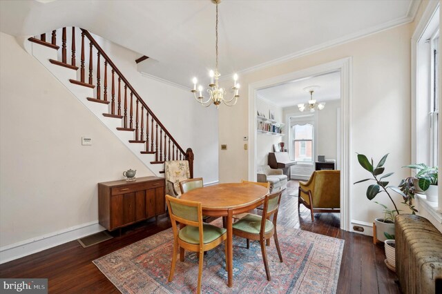 2347 E Norris St, Philadelphia, PA 19125 - dining room with a chandelier, dark wood finished floors, stairway, crown molding, and baseboards