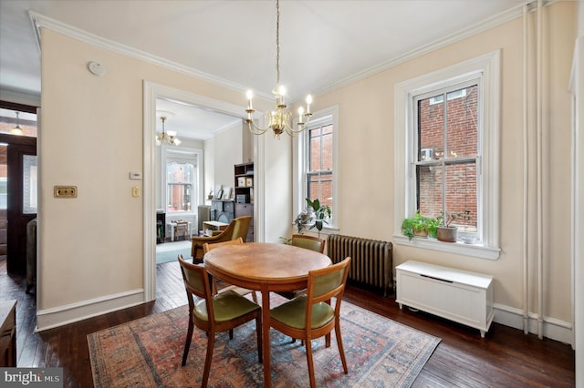 2347 E Norris St, Philadelphia, PA 19125 - dining room with a chandelier, crown molding, radiator heating unit, plenty of natural light, and dark wood-style flooring