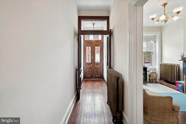 2347 E Norris St, Philadelphia, PA 19125 - entryway featuring radiator heating unit, a chandelier, hardwood / wood-style flooring, plenty of natural light, and ornamental molding