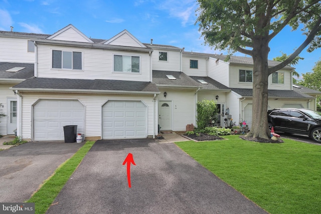 6 Carob Ct, Lumberton, NJ 08048 - multi unit property with asphalt driveway, a front lawn, an attached garage, and a shingled roof