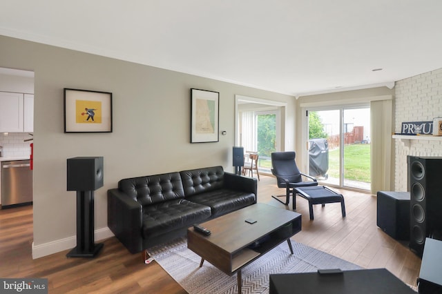 6 Carob Ct, Lumberton, NJ 08048 - living room with crown molding, wood finished floors, a fireplace, and baseboards