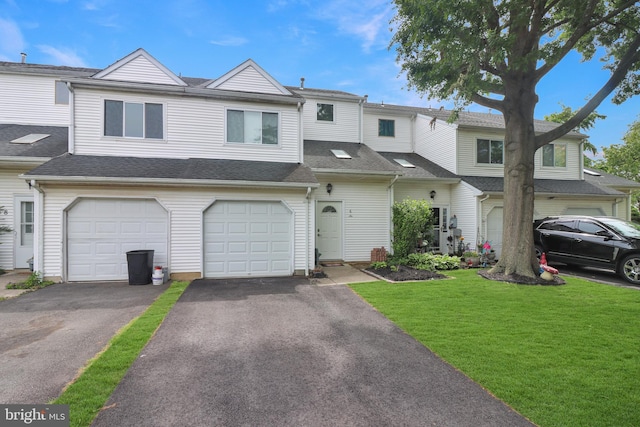 6 Carob Ct, Lumberton, NJ 08048 - townhome / multi-family property with driveway, a front lawn, a garage, and a shingled roof