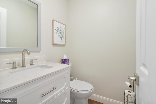 6 Carob Ct, Lumberton, NJ 08048 - half bath featuring vanity, toilet, baseboards, and wood finished floors