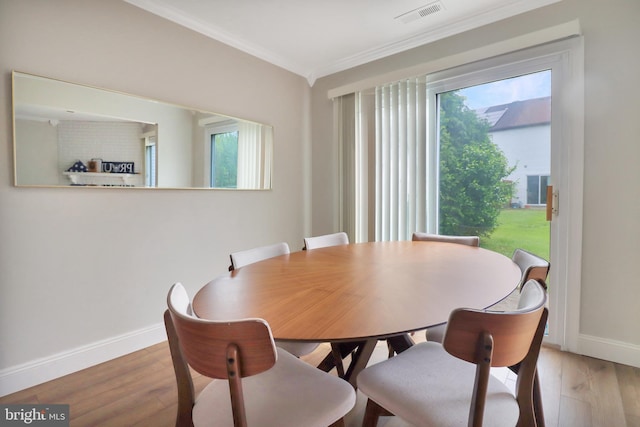 6 Carob Ct, Lumberton, NJ 08048 - dining area featuring crown molding, baseboards, healthy amount of natural light, and wood finished floors