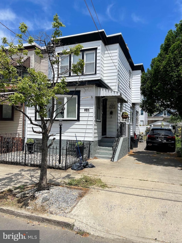 1116 N 19th St, Camden, NJ 08105 - townhome / multi-family property with a fenced front yard