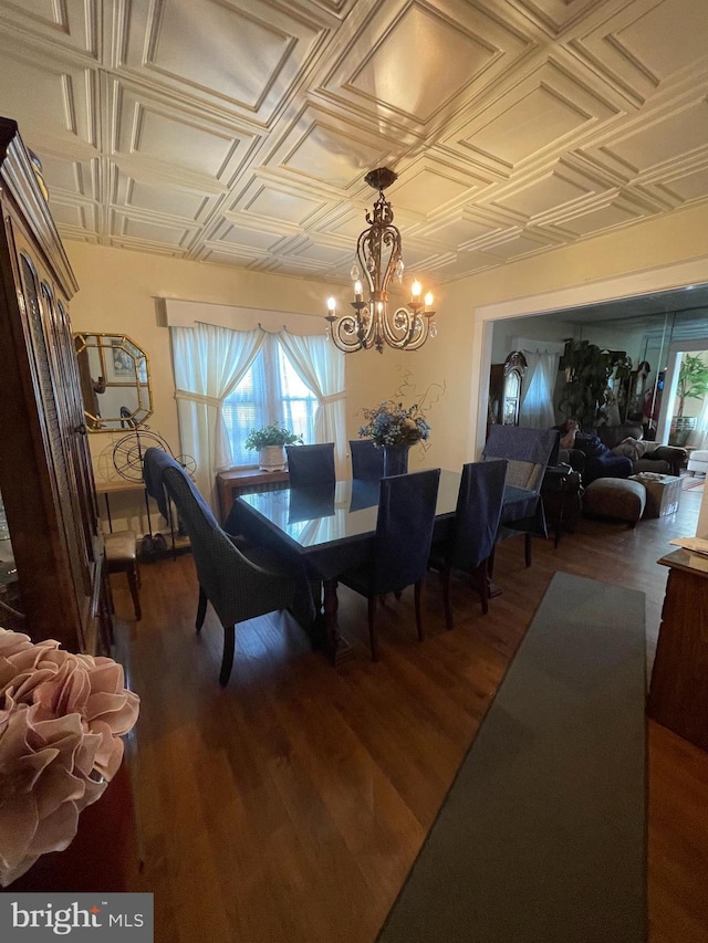 1116 N 19th St, Camden, NJ 08105 - dining space with an ornate ceiling, a chandelier, and dark wood-style flooring