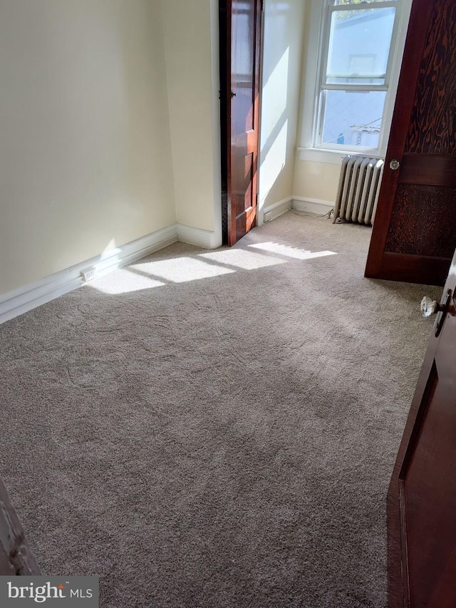1116 N 19th St, Camden, NJ 08105 - unfurnished room with radiator heating unit, carpet, and baseboards