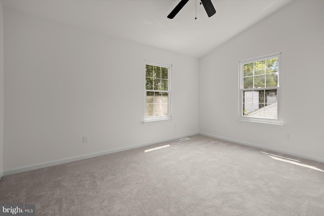 9439 Fens Holw, Laurel, MD 20723 - carpeted spare room with vaulted ceiling, ceiling fan, and baseboards