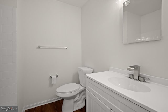 9439 Fens Holw, Laurel, MD 20723 - bathroom with wood finished floors, vanity, toilet, and baseboards