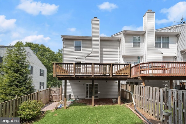 9439 Fens Holw, Laurel, MD 20723 - rear view of property featuring a deck and a chimney