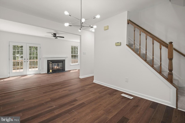 9439 Fens Holw, Laurel, MD 20723 - unfurnished living room with a ceiling fan, dark wood-type flooring, french doors, and a chandelier