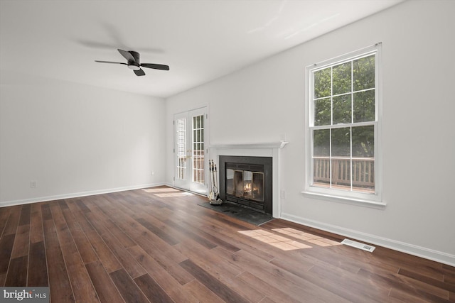9439 Fens Holw, Laurel, MD 20723 - unfurnished living room with wood finished floors, a fireplace with flush hearth, and a ceiling fan