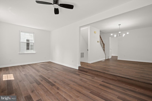 9439 Fens Holw, Laurel, MD 20723 - unfurnished room with stairway, a chandelier, a ceiling fan, and dark wood-style floors