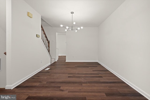 9439 Fens Holw, Laurel, MD 20723 - unfurnished dining area featuring a chandelier, dark wood-style floors, stairs, and baseboards
