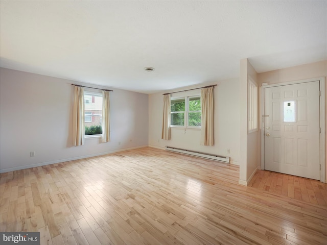 14754 Sherwood Dr, Greencastle, PA 17225 - entryway with a baseboard radiator, light wood-style flooring, and baseboards