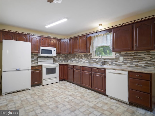 14754 Sherwood Dr, Greencastle, PA 17225 - kitchen featuring white appliances, a sink, and decorative backsplash