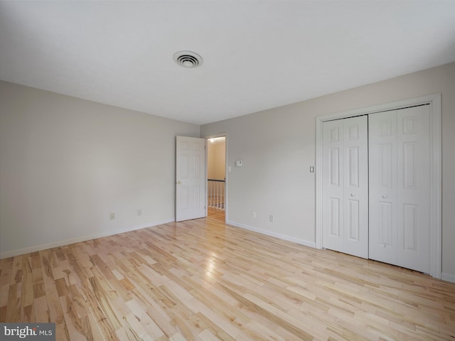 14754 Sherwood Dr, Greencastle, PA 17225 - unfurnished bedroom featuring light wood finished floors, baseboards, and a closet