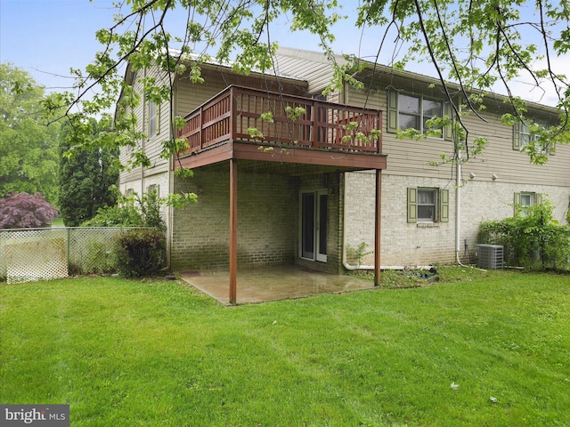 14754 Sherwood Dr, Greencastle, PA 17225 - back of property with central AC unit, a deck, and a patio area