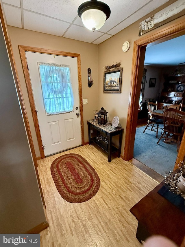 239 S Allison St, Greencastle, PA 17225 - entryway featuring a drop ceiling, wood finished floors, and baseboards