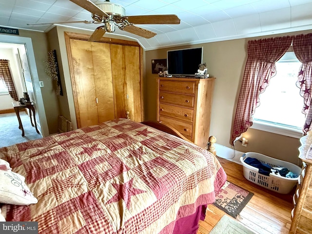 239 S Allison St, Greencastle, PA 17225 - bedroom with a closet, a ceiling fan, wood finished floors, and crown molding