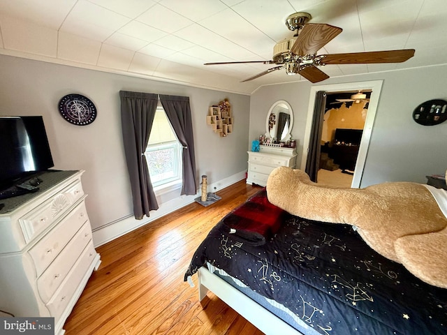 239 S Allison St, Greencastle, PA 17225 - bedroom with wood finished floors, baseboards, and a ceiling fan