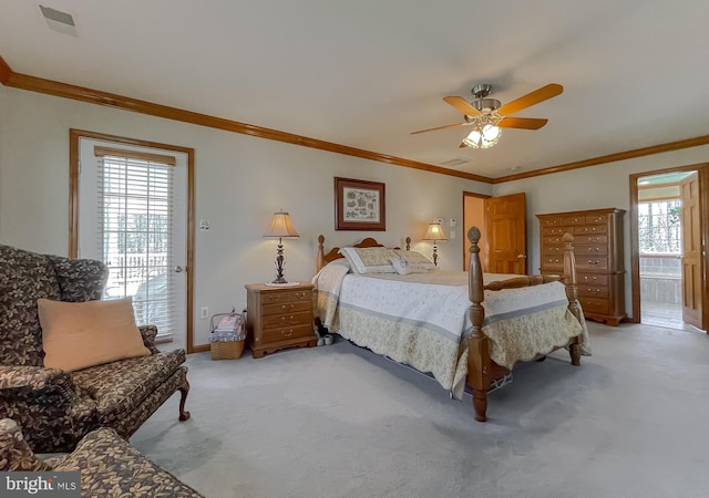 6290 Nicole Dr, Saint Leonard, MD 20685 - bedroom with light colored carpet, ornamental molding, a ceiling fan, ensuite bathroom, and baseboards