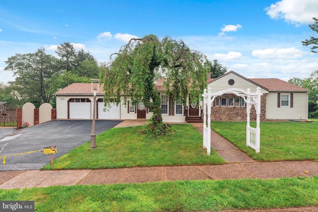 905 Henrietta Ave, Huntingdon Valley, PA 19006 - view of front of home with an attached garage, a gate, driveway, and covered porch