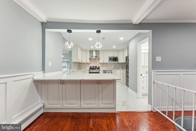905 Henrietta Ave, Huntingdon Valley, PA 19006 - kitchen featuring wall chimney exhaust hood, appliances with stainless steel finishes, a peninsula, light stone counters, and white cabinets