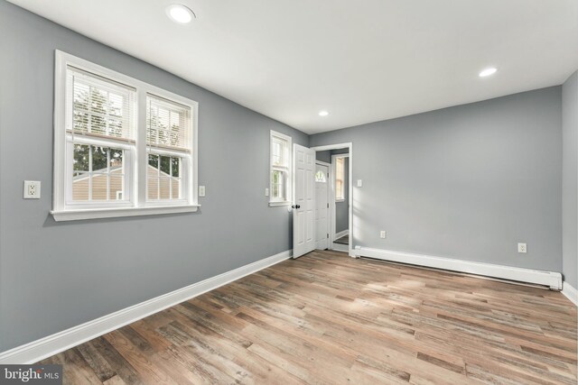 905 Henrietta Ave, Huntingdon Valley, PA 19006 - unfurnished bedroom with a baseboard radiator, baseboards, wood finished floors, and recessed lighting