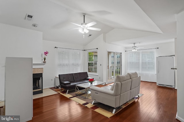 5605 Willoughby Newton Dr Unit 31, Centreville, VA 20120 - living room featuring ceiling fan, vaulted ceiling, wood-type flooring, and a fireplace