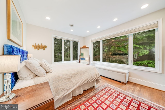 3100 Rodman St NW, Washington, DC 20008 - bedroom featuring wood finished floors, recessed lighting, and baseboards
