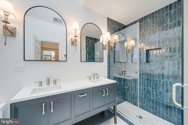 3100 Rodman St NW, Washington, DC 20008 - bathroom with a stall shower, double vanity, and toilet