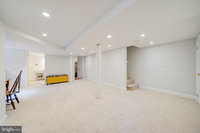 3100 Rodman St NW, Washington, DC 20008 - finished below grade area with light carpet, baseboards, stairway, recessed lighting, and brick wall