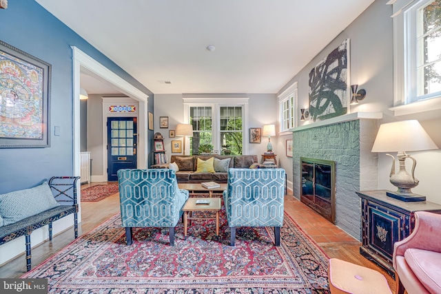 3100 Rodman St NW, Washington, DC 20008 - living area with a stone fireplace and plenty of natural light
