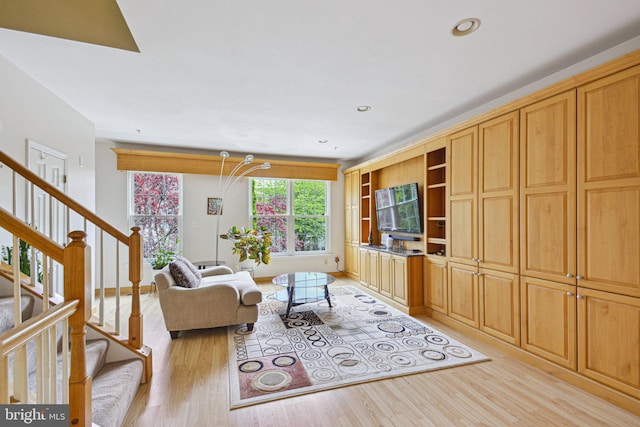 13146 Diamond Hill Dr, Germantown, MD 20874 - living area with light wood-style flooring, stairs, and recessed lighting