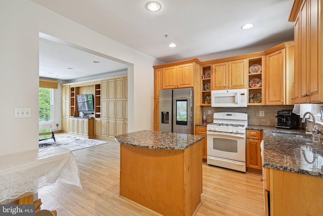13146 Diamond Hill Dr, Germantown, MD 20874 - kitchen featuring white appliances, open shelves, a kitchen island, a sink, and light wood-style flooring