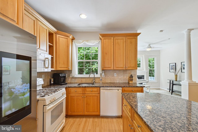 13146 Diamond Hill Dr, Germantown, MD 20874 - kitchen featuring white appliances, a sink, dark stone countertops, tasteful backsplash, and recessed lighting