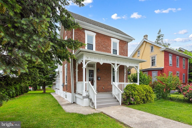 20 N Richardson Ave, Lansdale, PA 19446 - view of front of property featuring brick siding, covered porch, and a front yard