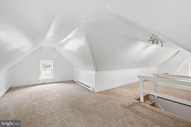 20 N Richardson Ave, Lansdale, PA 19446 - bonus room with a baseboard heating unit, carpet flooring, vaulted ceiling, and baseboards