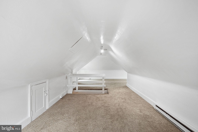 20 N Richardson Ave, Lansdale, PA 19446 - additional living space with a baseboard heating unit, carpet, lofted ceiling, and baseboards