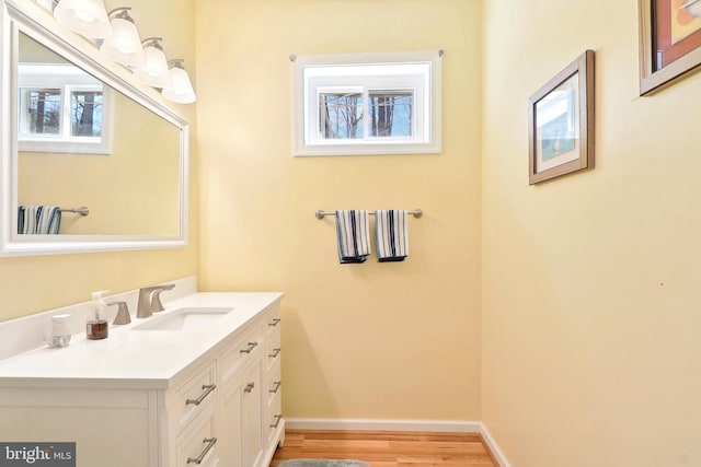 7951 Kelly Ann Ct, Fairfax Station, VA 22039 - bathroom featuring vanity, wood finished floors, and baseboards