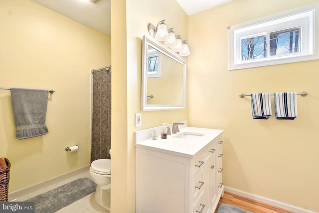 7951 Kelly Ann Ct, Fairfax Station, VA 22039 - bathroom featuring vanity, baseboards, and toilet