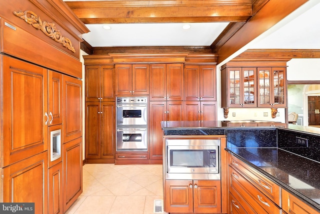 7951 Kelly Ann Ct, Fairfax Station, VA 22039 - kitchen with appliances with stainless steel finishes, beam ceiling, glass insert cabinets, light tile patterned floors, and dark stone countertops