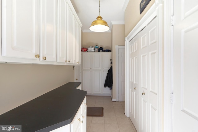 7951 Kelly Ann Ct, Fairfax Station, VA 22039 - washroom featuring crown molding and light tile patterned flooring